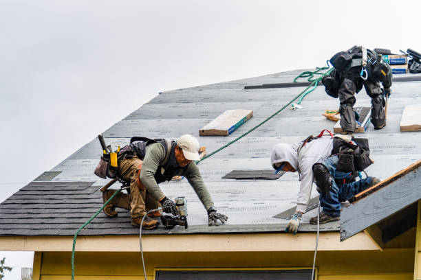 Professional Gutter Installation technician working in South Weymouth, MA